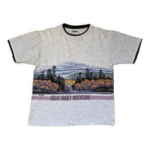 Load image into Gallery viewer, heather grey short sleeve shirt of grey smoky mountains that continues all around the entire shirt. lettering bellow image says great smoky mountains. shirt is double layer with black as the fabric.