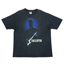 Load image into Gallery viewer, Eric Clapton in white lettering with a black silhouette of eric clapton and a blue haze behind him on a black shirt
