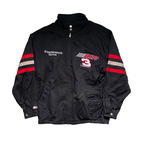 BLACK RACING JACKET OF DALE EARNHARDT ZIP UP WITH 2 BUTTON CLOSURES AT THE COLLAR. 3 STRIPES ON EACH ARM RED, TAN, RED. GOODWRENCH SERVICES EMBROIDERED ON THE RIGHT CHEST. RCR WITH CHECKERED FLAG AND NUMBER 3 AND DALE'S SIGNATURED ALL EMBROIDERED ON LEFT CHEST. 2 POCKETS. POCKET CLOSURES ON WRIST