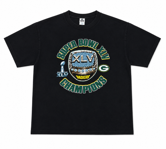 A black short-sleeve crewneck t-shirt featuring a large graphic print for Green Bay Packers Super Bowl XLIV Champions. The graphic includes the Lombardi trophy, the Super Bowl logo, the Packers 'G' logo, and 'SUPER BOWL XLIV CHAMPIONS' in green and gold lettering.