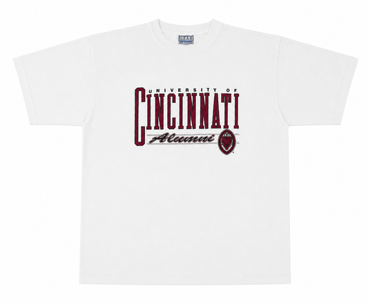 A white short-sleeve t-shirt with a maroon and black graphic on the chest reading 'University of Cincinnati Alumni' alongside a football logo, shown on a plain white background.