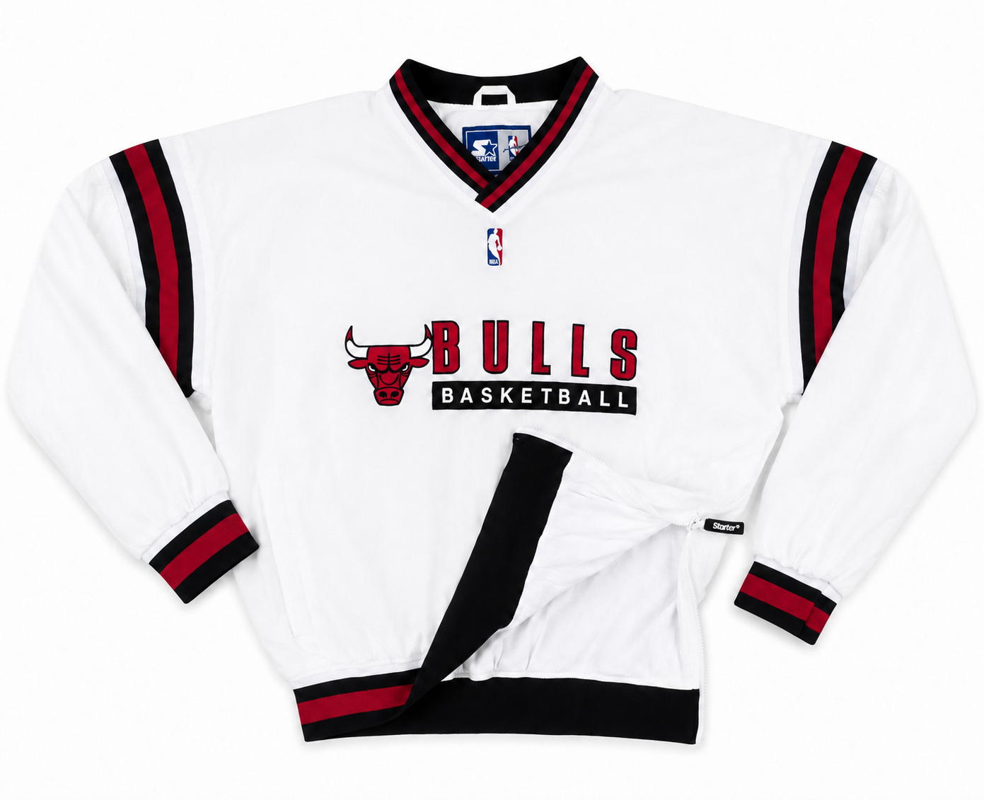 A white Chicago Bulls basketball pullover jacket with red and black trim, featuring the team logo and 'BULLS BASKETBALL' text on the front.