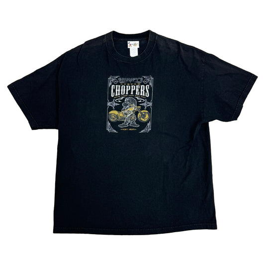 BLACK T-SHIRT WITH GRUMPY CHOPPERS ON THE FRONT AND THERE IS A YELLOW MOTORCYCLE AND GRUMPY STANDING INFRONT OF IT