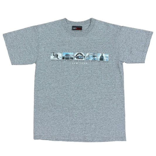 GRAY SHORT SLEEVE SHIRT WITH ESPN ZONE LOGO ON THE FRONT WITH IMAGES OFR STATUE OF LIBERTY, TAXI, CRYSLER BUILDING AND THEV WORD NEW YORK BELOW IMAGES