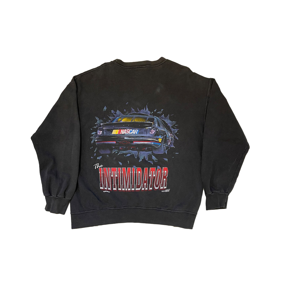 back of the crewneck. continuation of front image. back of the car that is smashing through the wall with words below saying the intimidator in red.