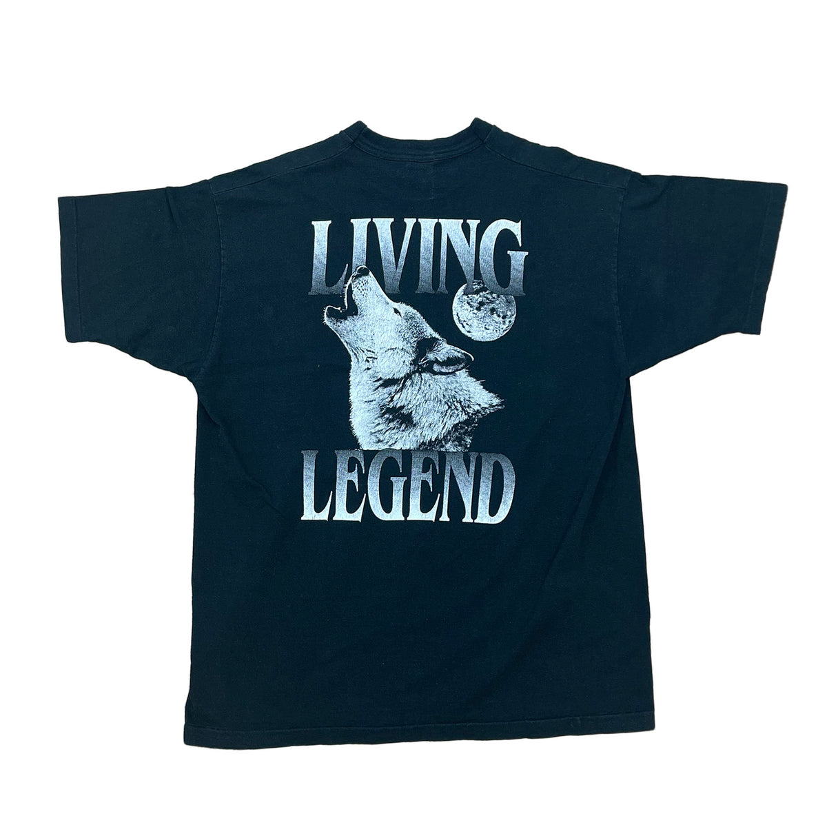 BACK SIDE. LIVING LEGEND IN WHITE LETTERING WITH A WOLF HOWLING AT MOON IN WHITE